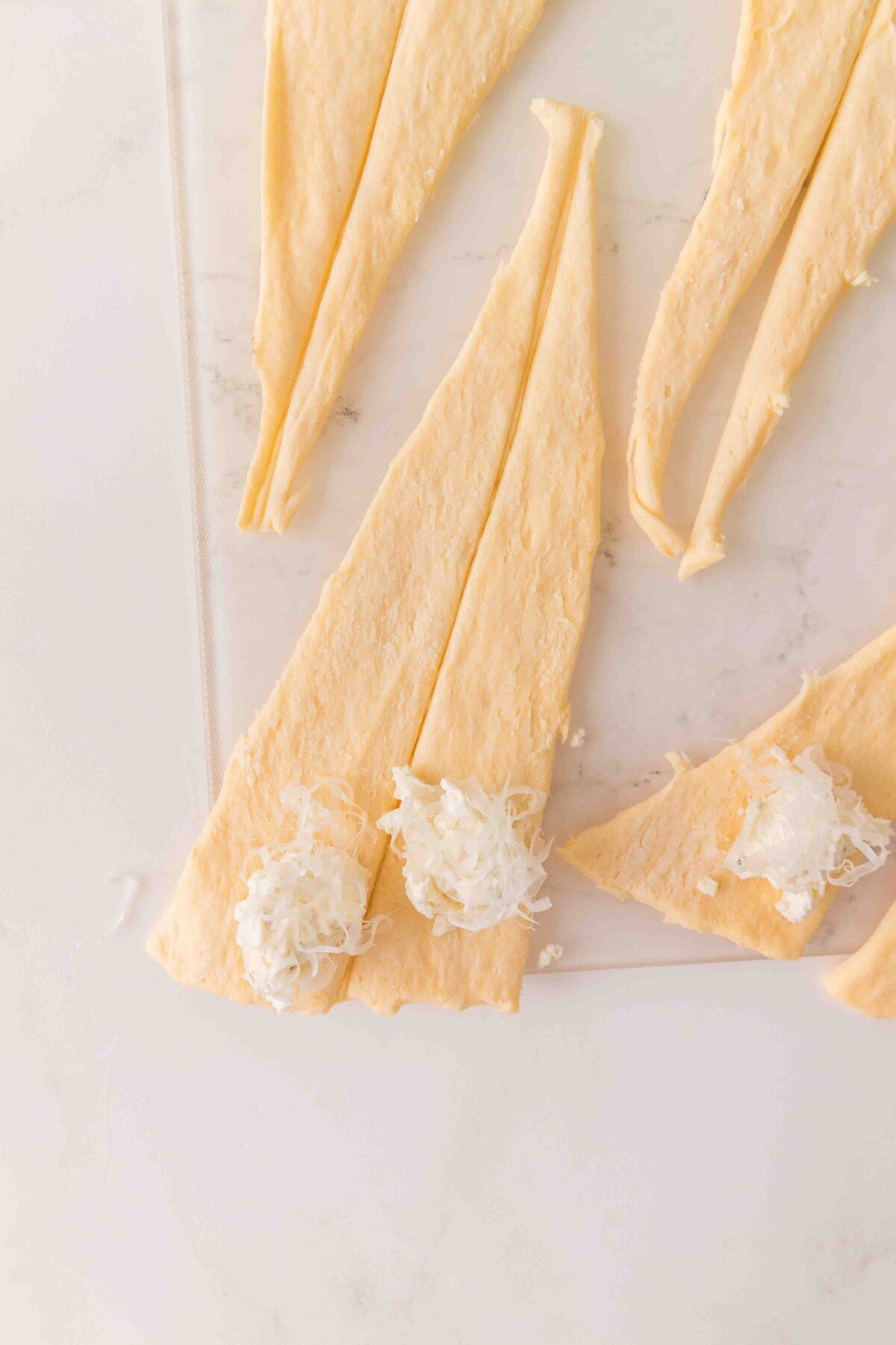 Adding the cheese stuffing.