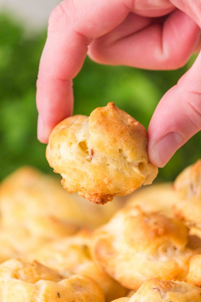 Holding a Stilton Bacon Gougere.