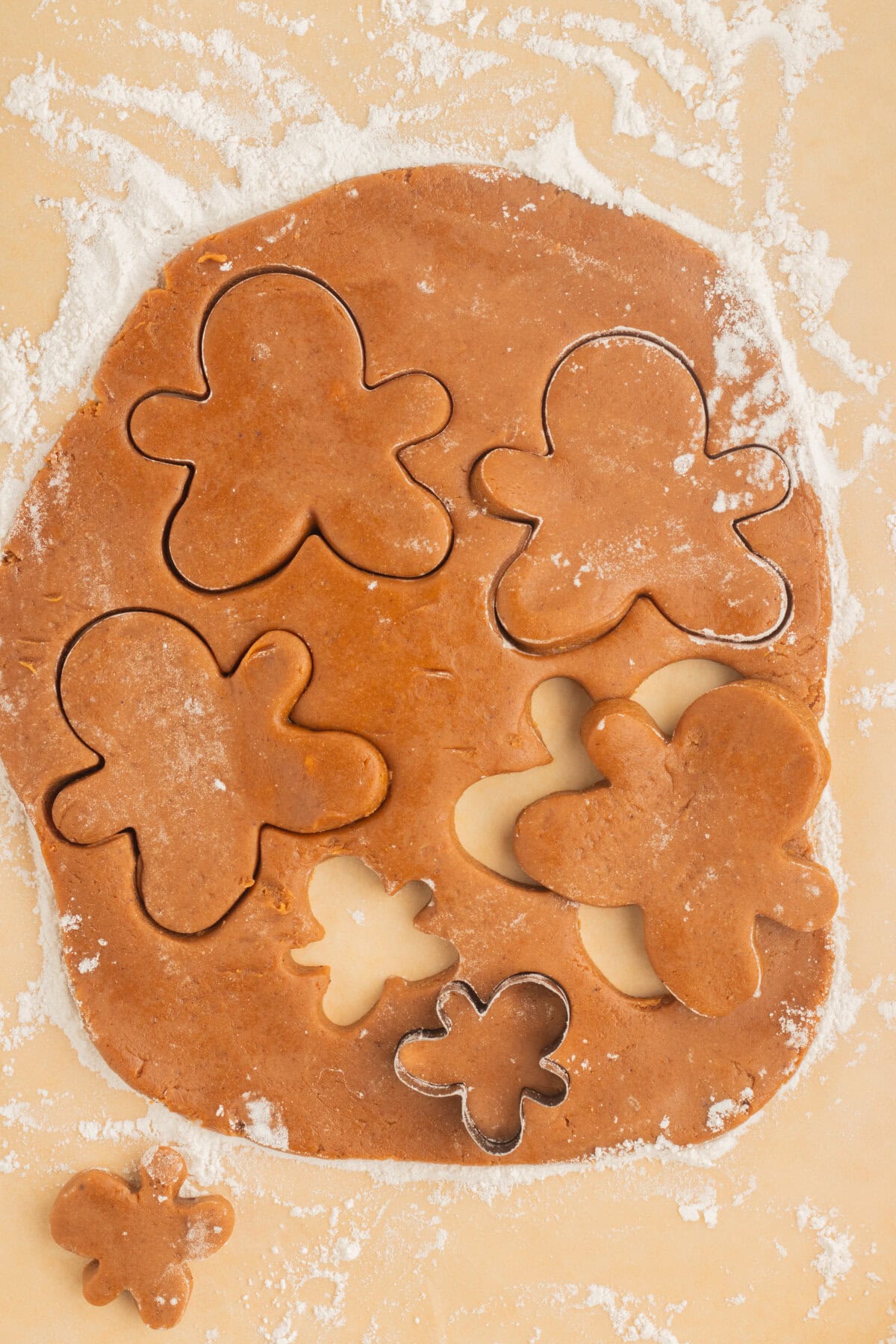 Cutting out gingerbread men. 