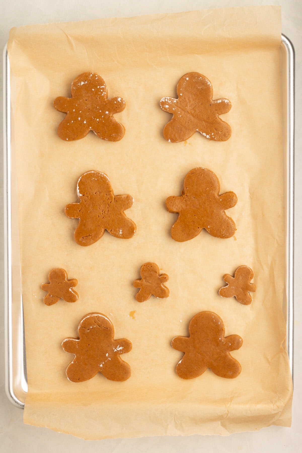 Gingerbread men on cookie sheet.