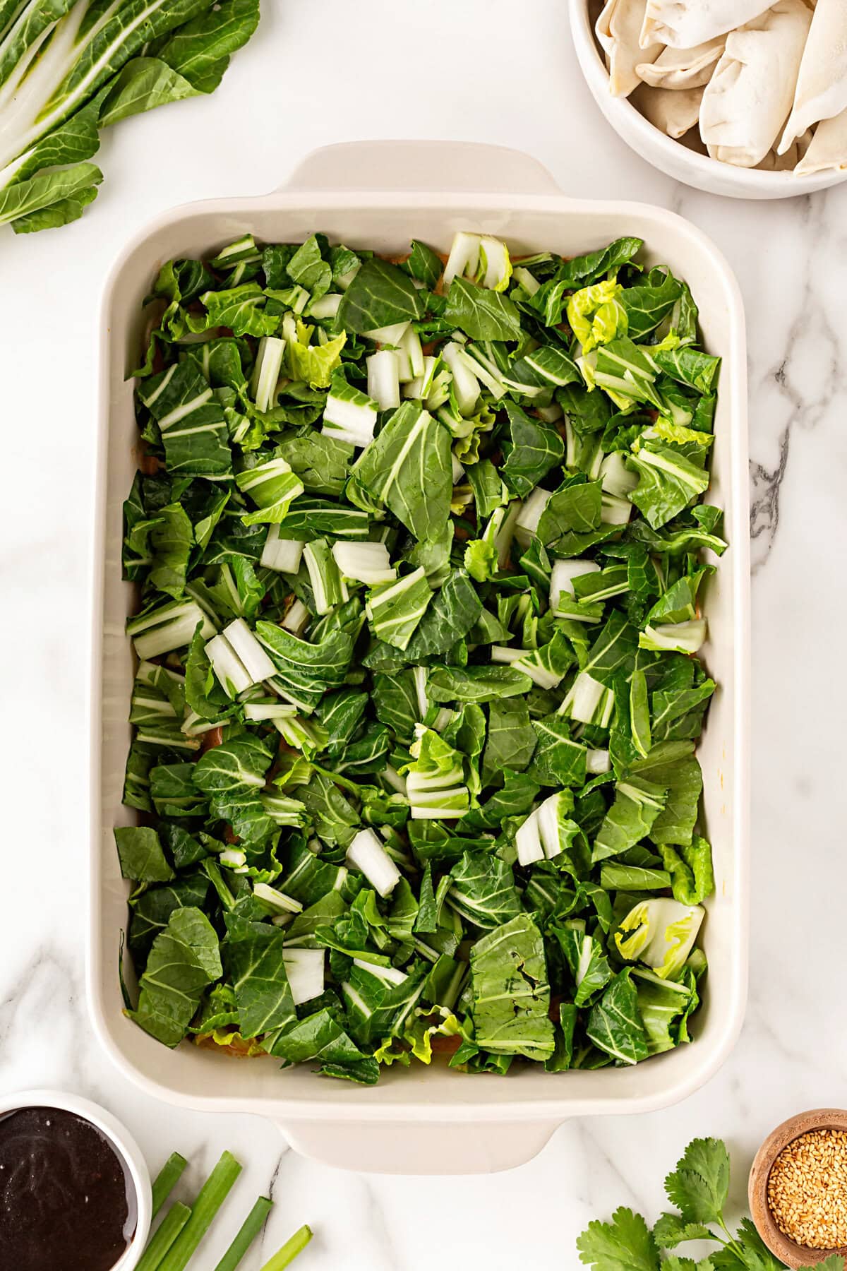 Bok Choy added to the casserole dish.