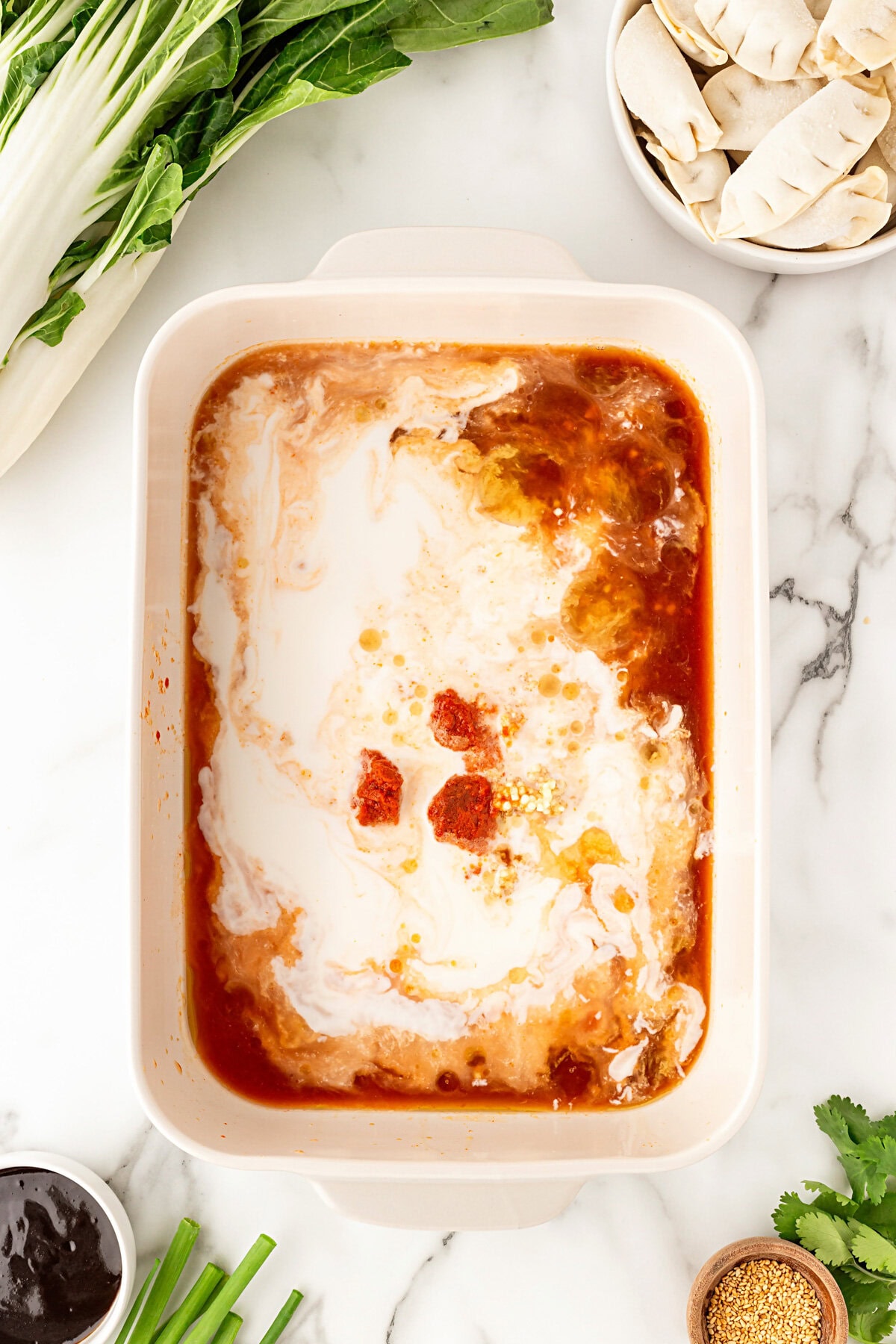 All liquid ingredients mixed in the caserole dish.