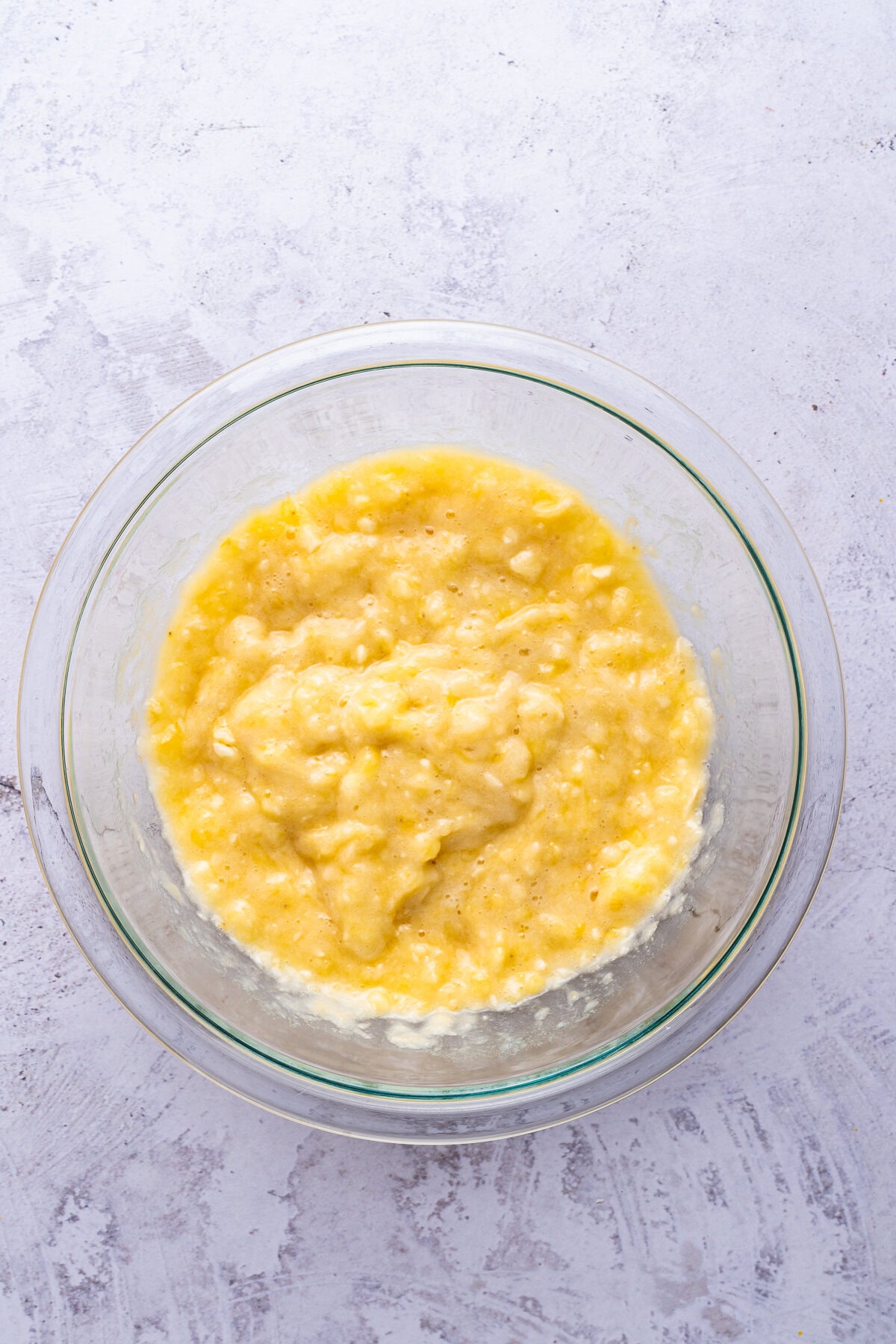 Butter, sugar, eggs, bananas, yogurt, and vanilla.