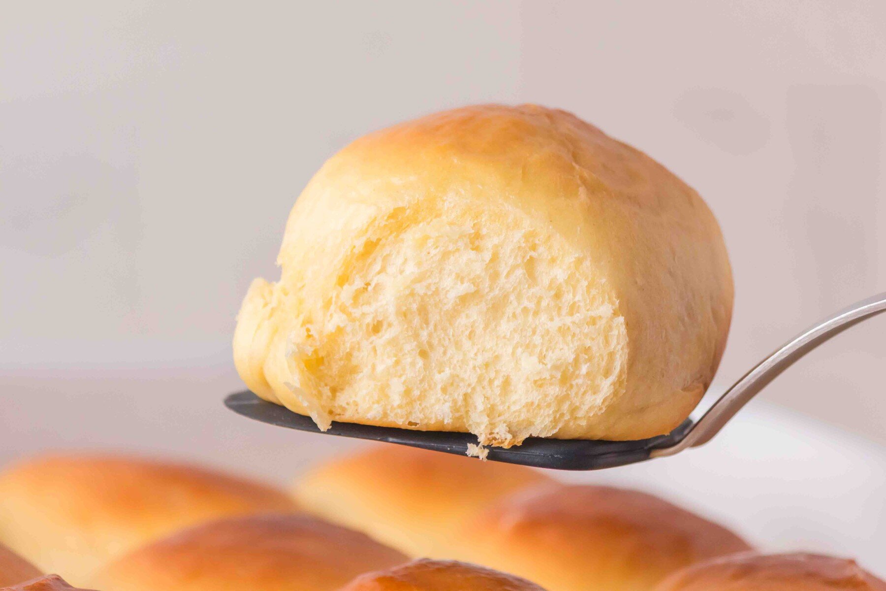 Hawaiian Dinner Roll on a spatula. 