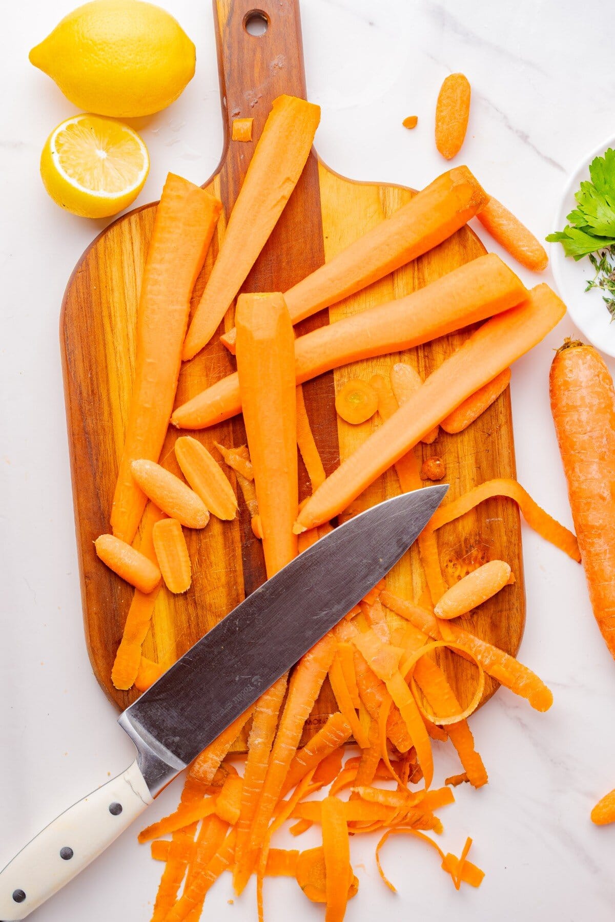Peeling and cutting carrots.