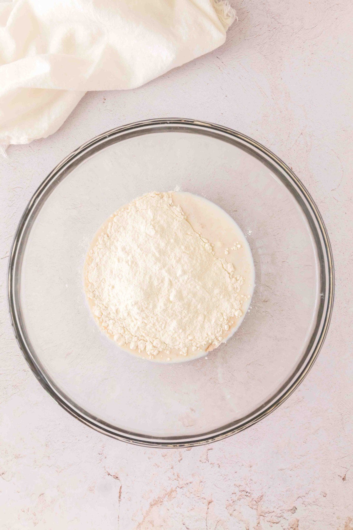 Sugar and half the flour added. 