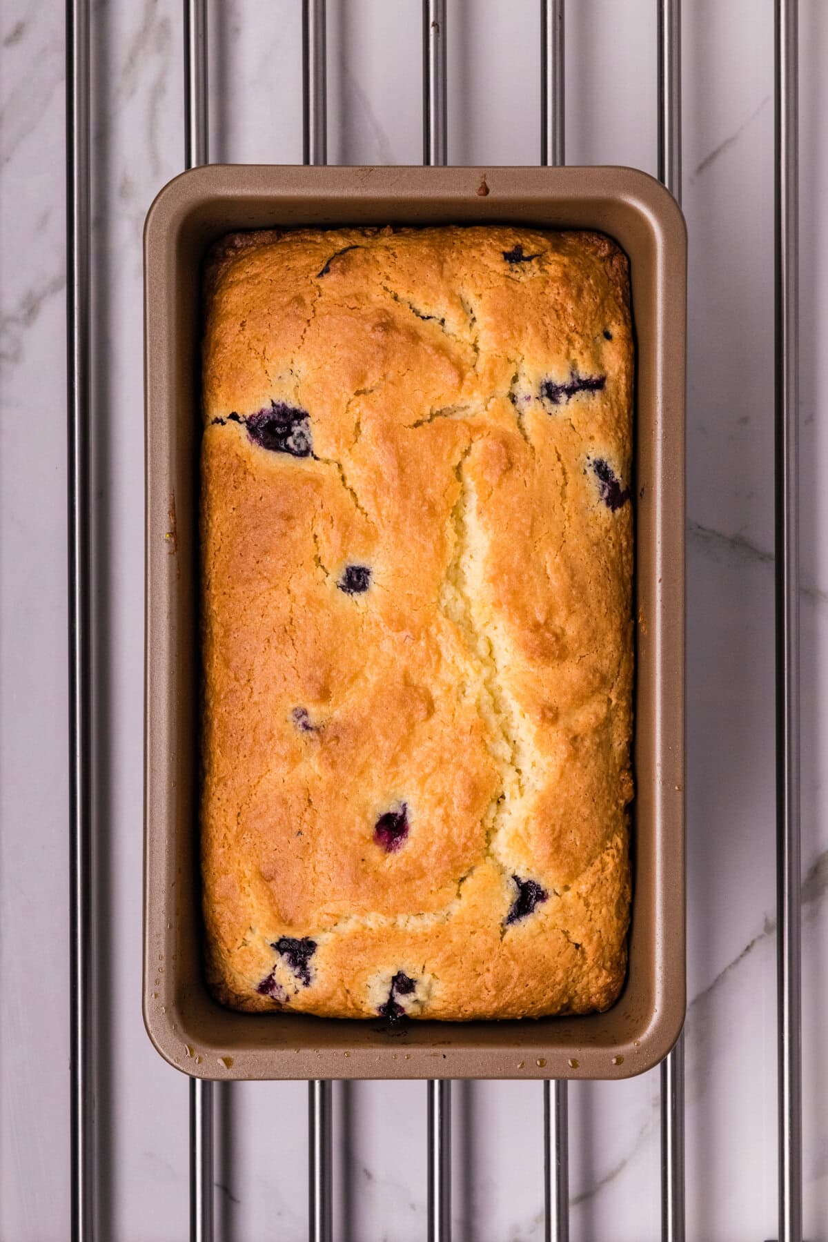 Baked loaf in the loaf pan.