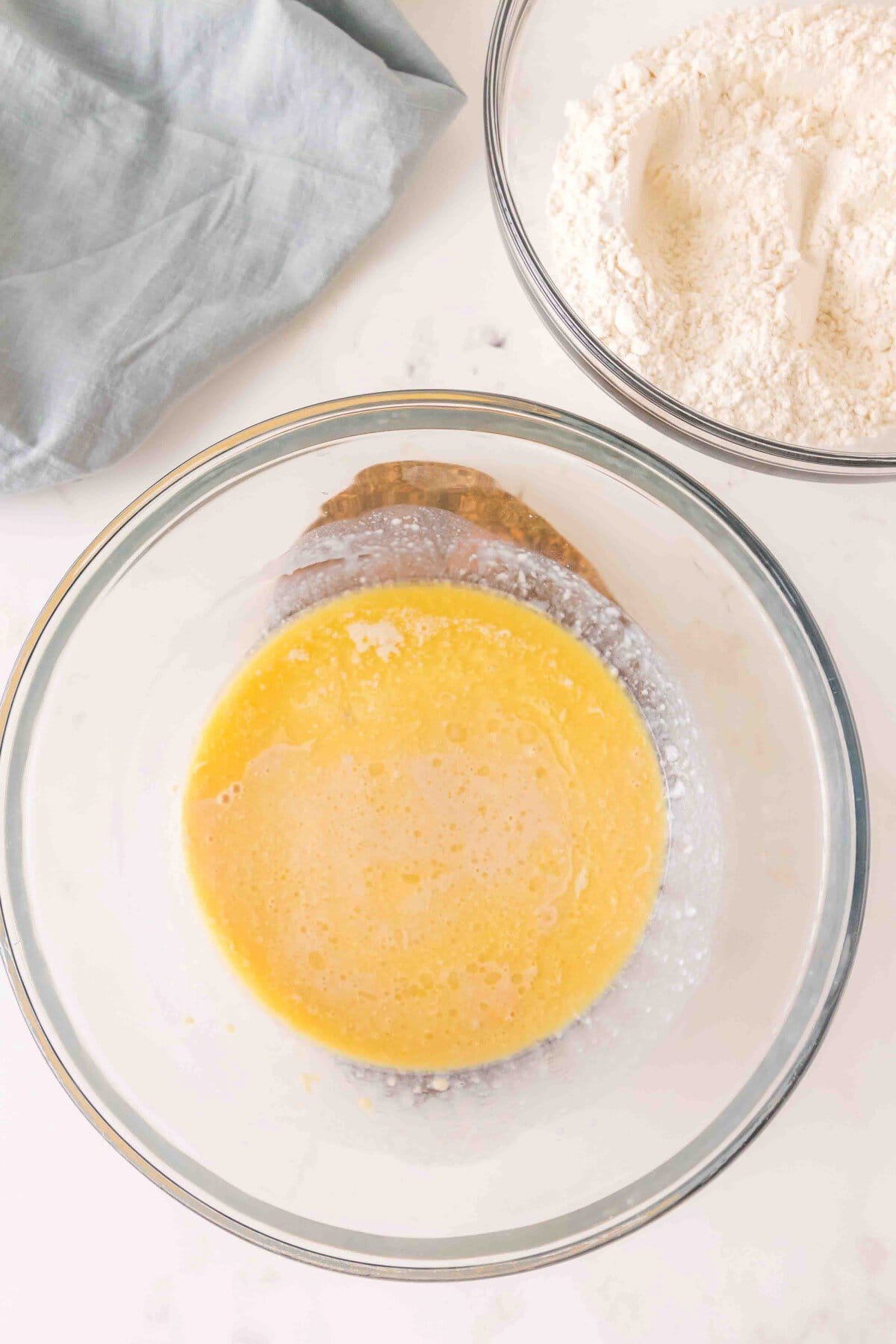 Cooled butter added to yeast mixture. 