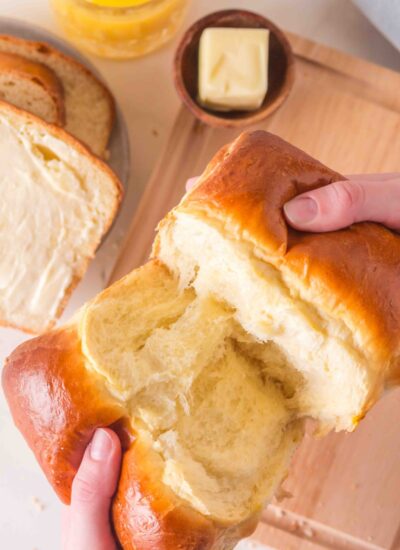 Pulling apart milk bread.