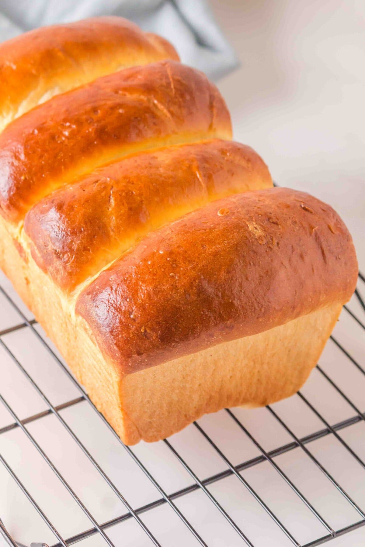 Japanese Milk Bread on a cooling rack.
