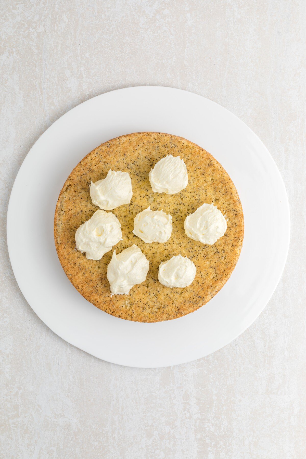 Dollops of icing on cake.