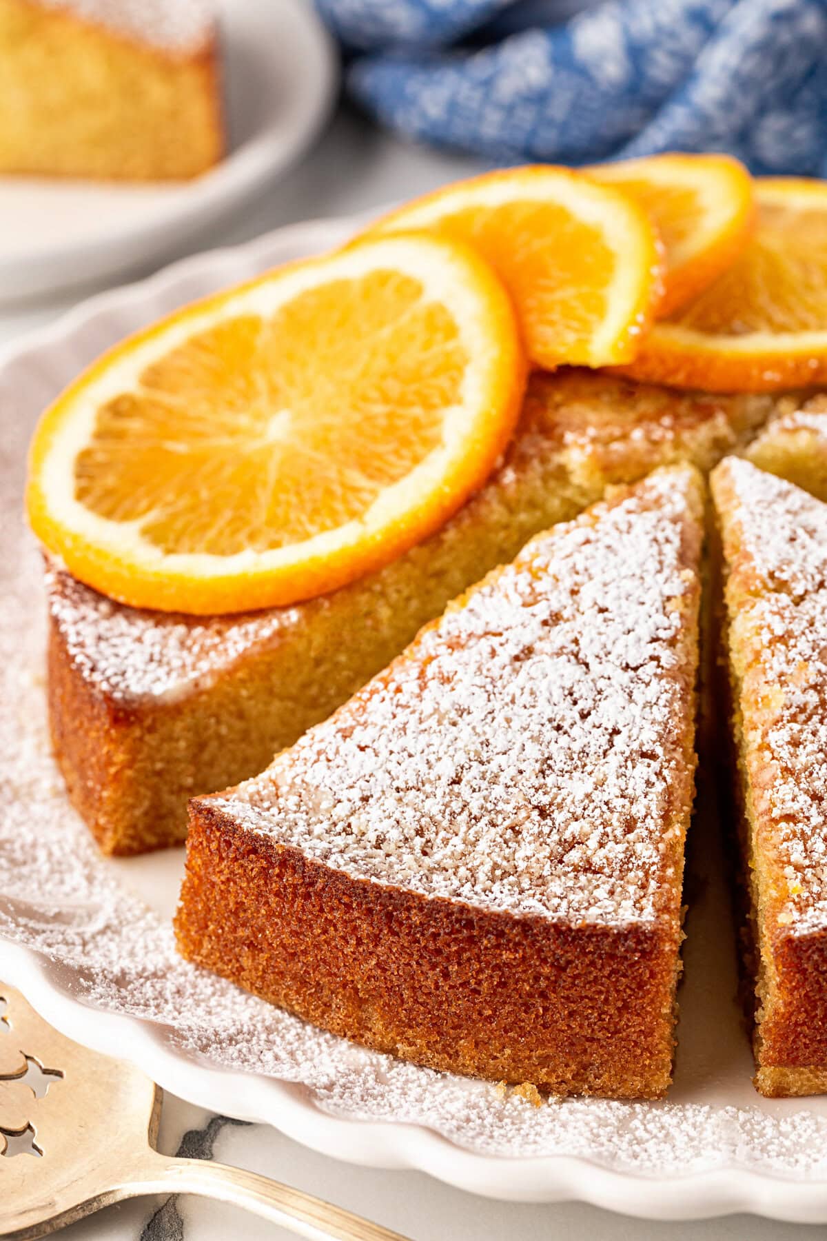 Orange Olive Oil Cake cut in slices.