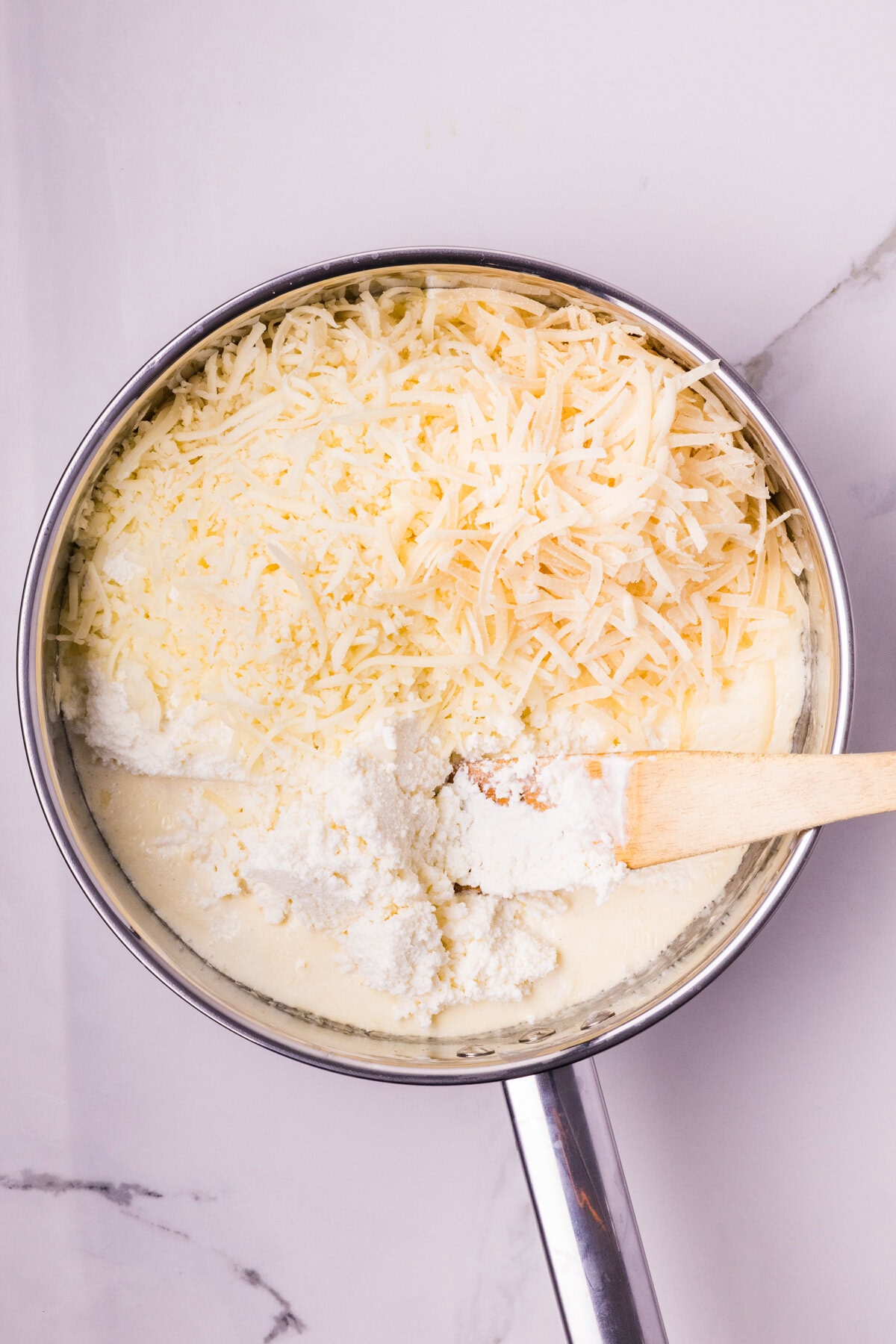Cheese added to cream sauce. 