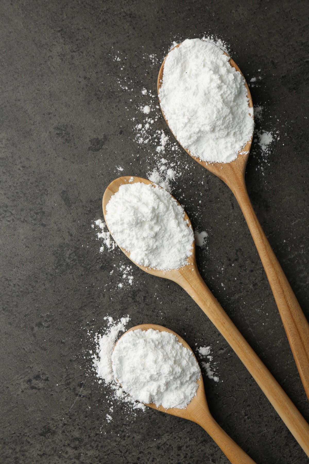 Baking soda on spoons. 
