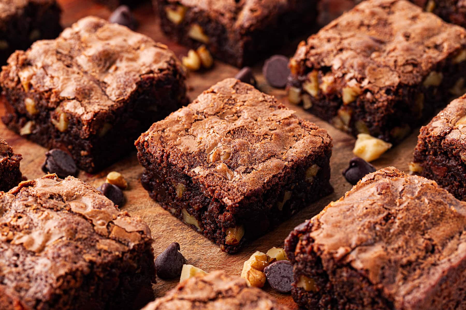 Brownies squares on a cutting board.