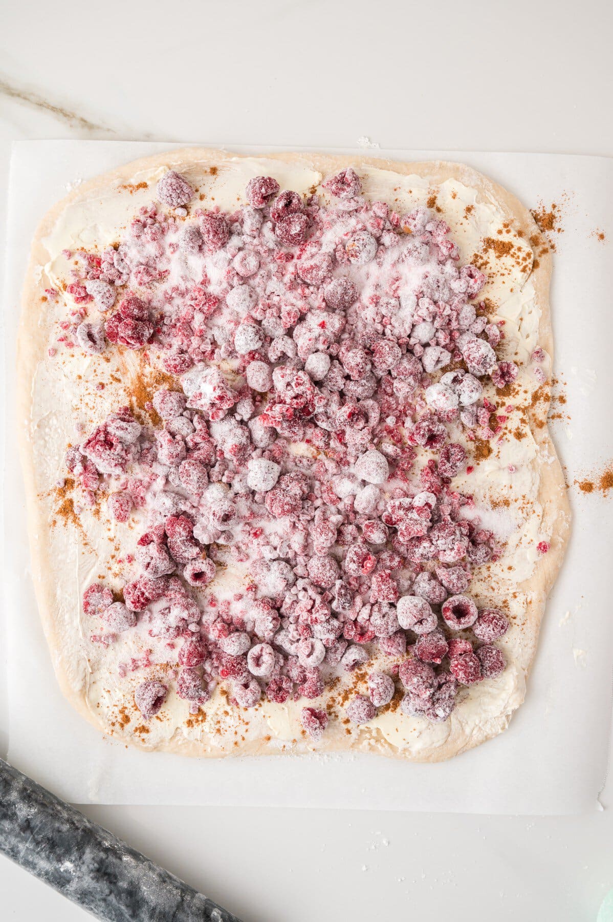 Frozen raspberries added and sugar. 