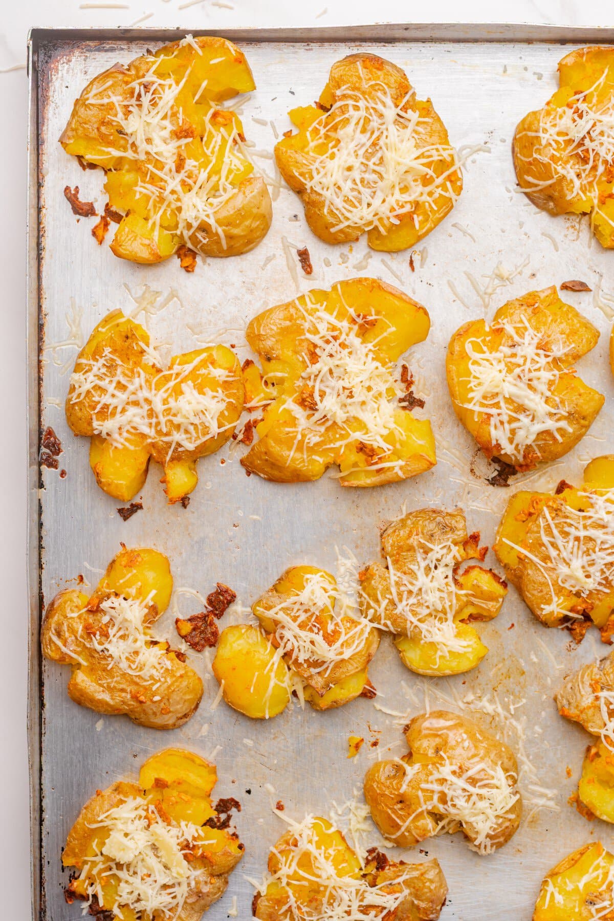 Parmesan on top of the potatoes.