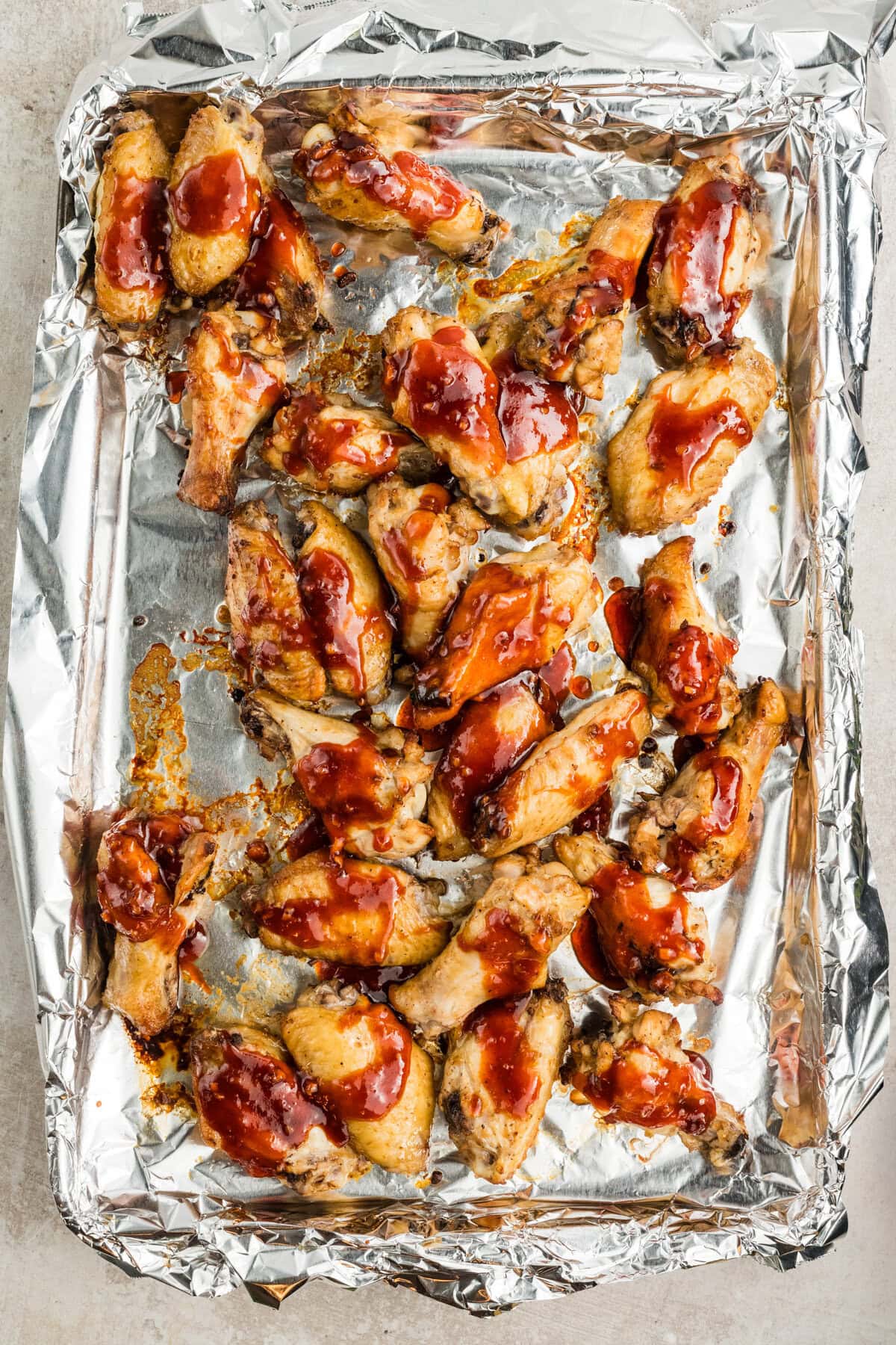 Saucing the wings. 