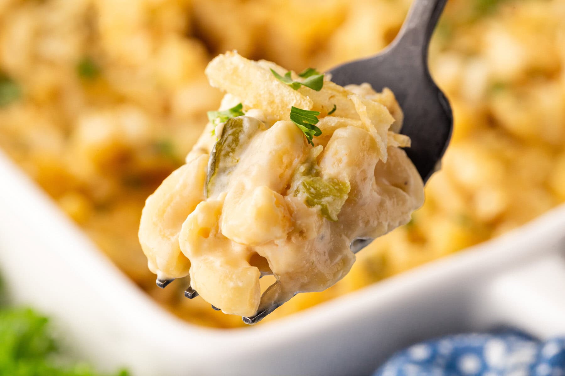 Mac and cheese on a fork.