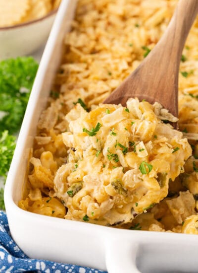 Taking out a spoonful of mac and cheese.