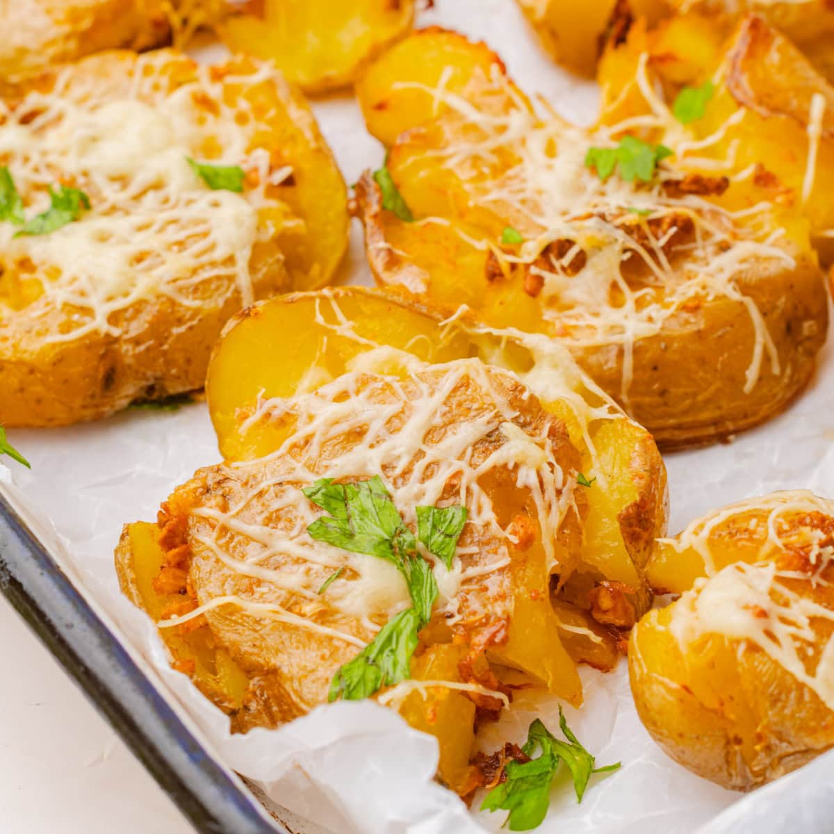 Finished Smashed Potatoes on a baking sheet. 