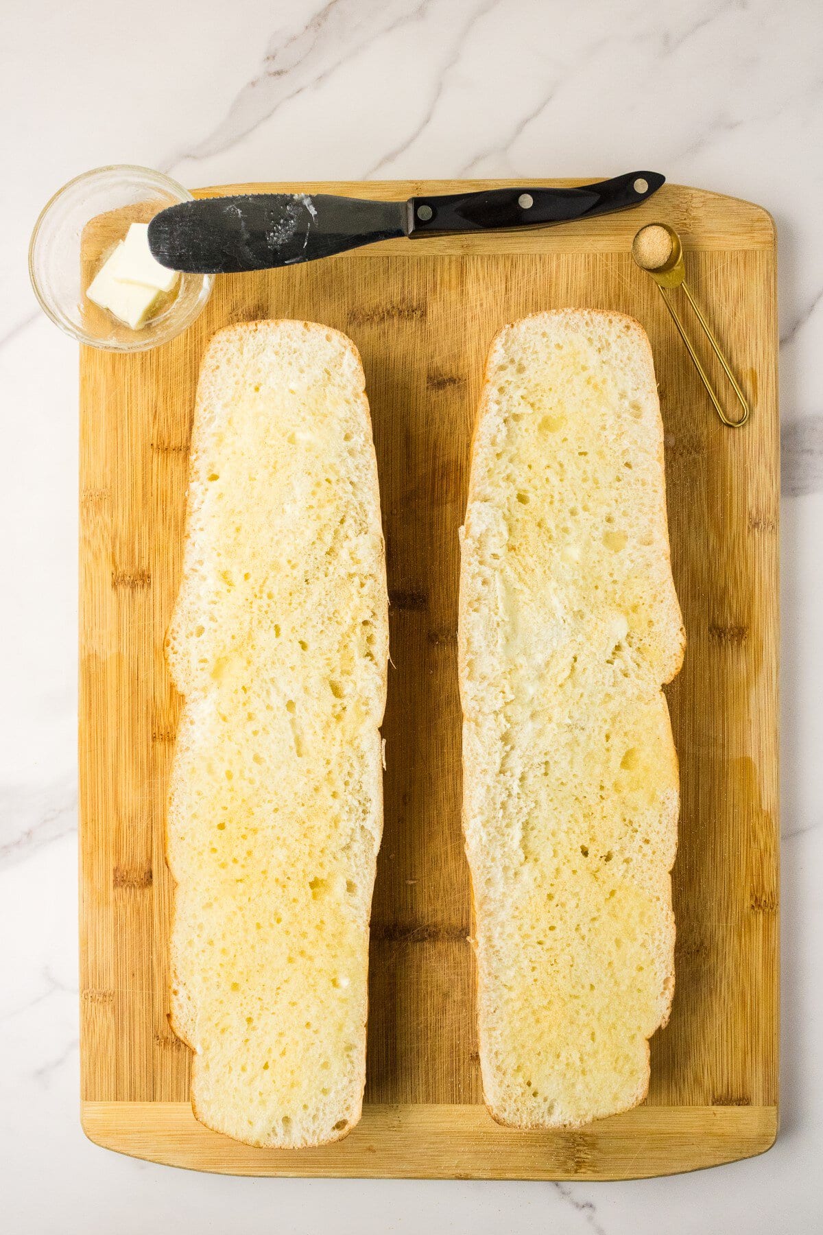 French bread sliced and buttered.