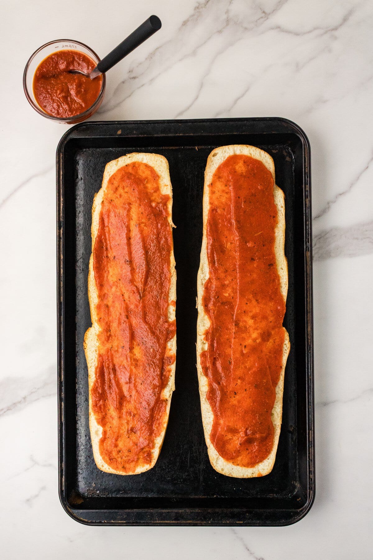 Pizza sauce in the bread.