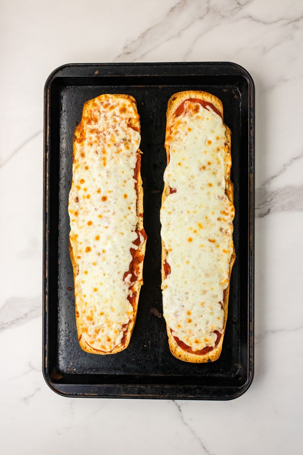 Baked until the cheese is melted.