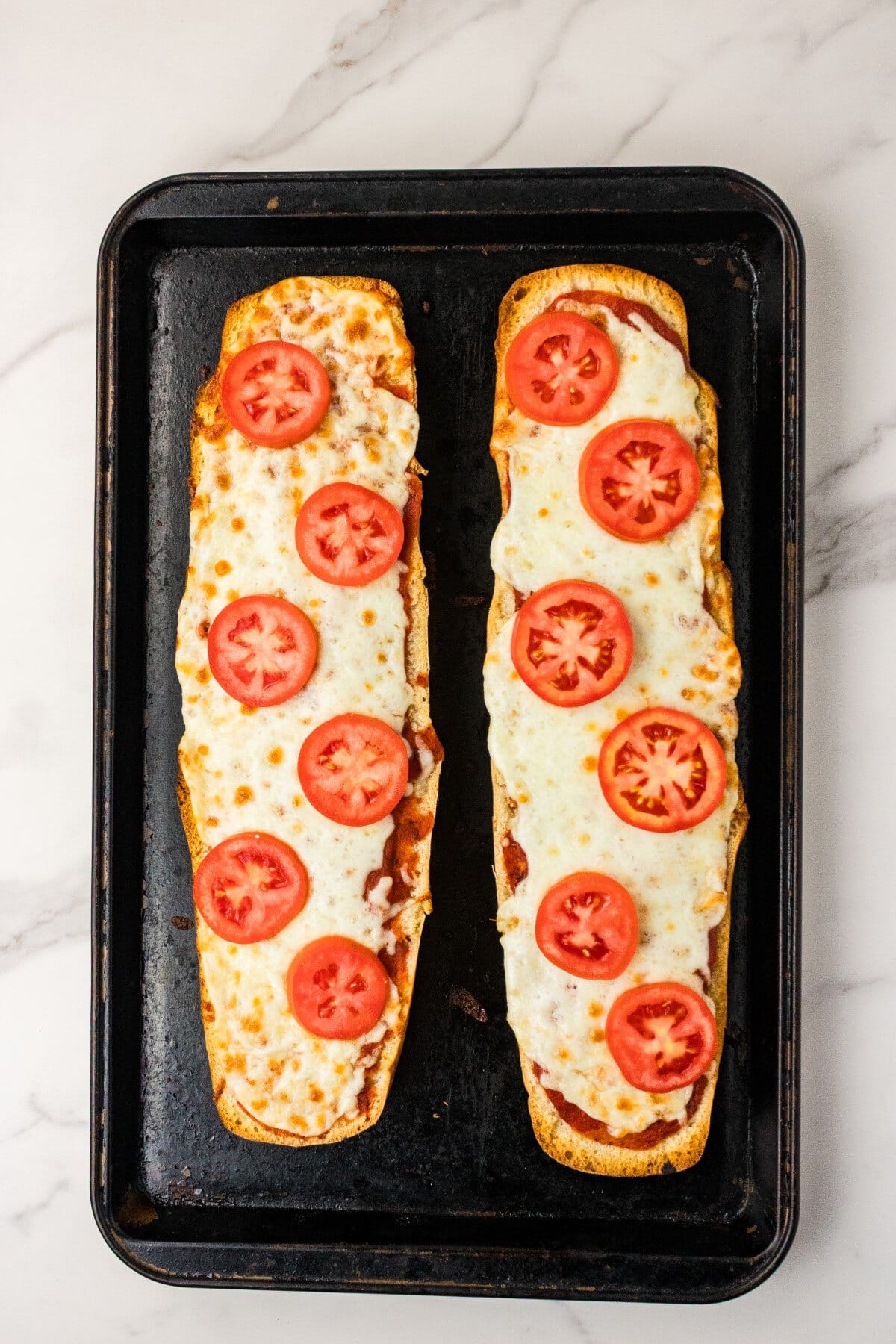 Topped with fresh tomatoes.