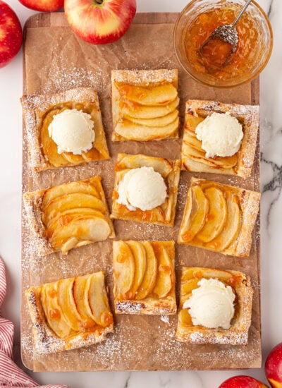 Tart cut up from overhead, some with ice cream.
