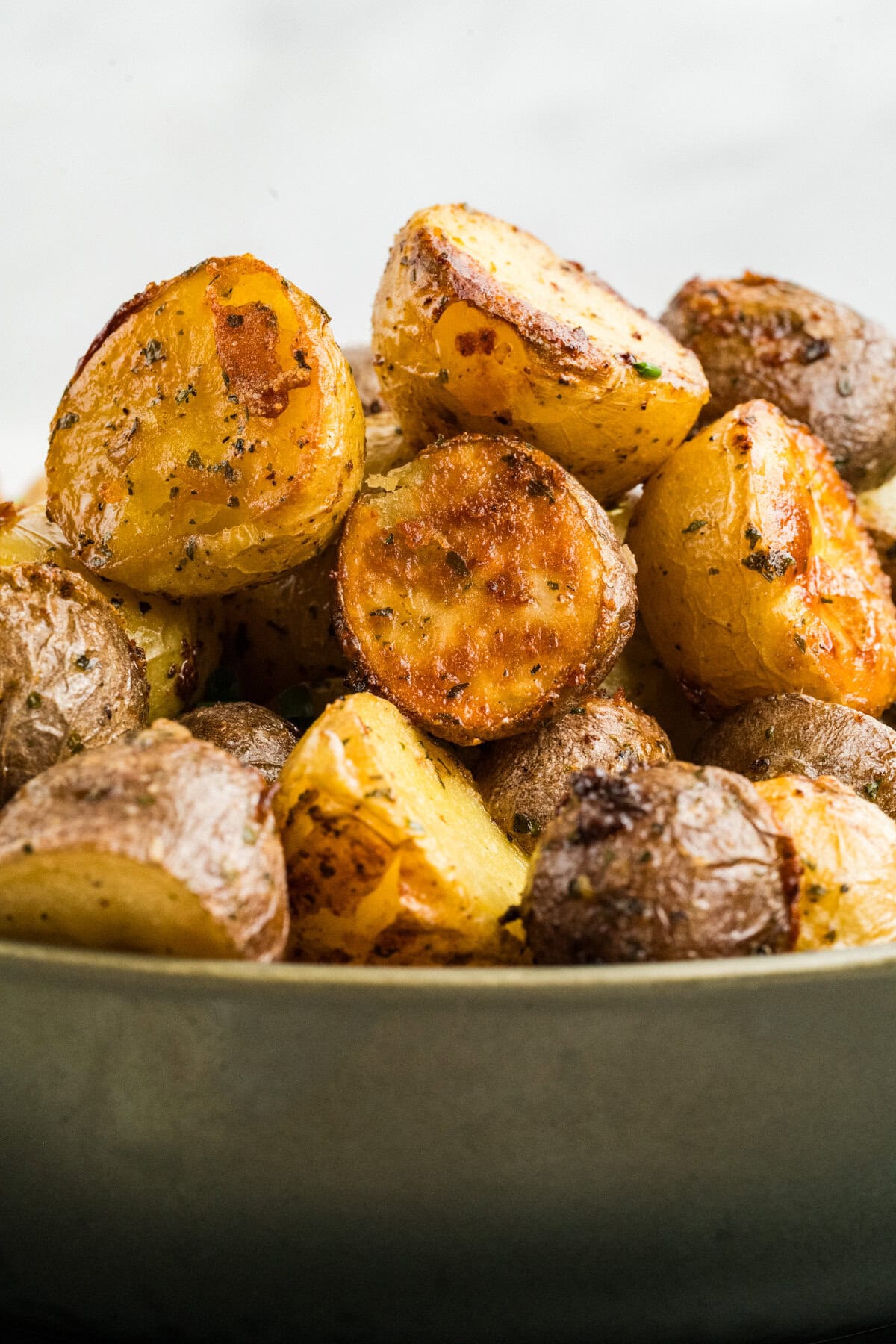 Ranch potatoes piled high close-up in a bowl. 