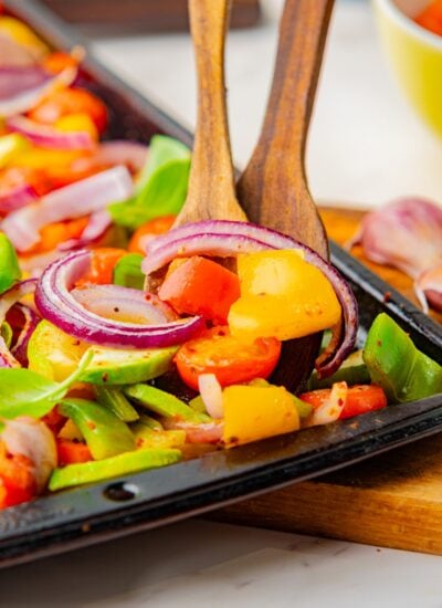 Spooning veggies.