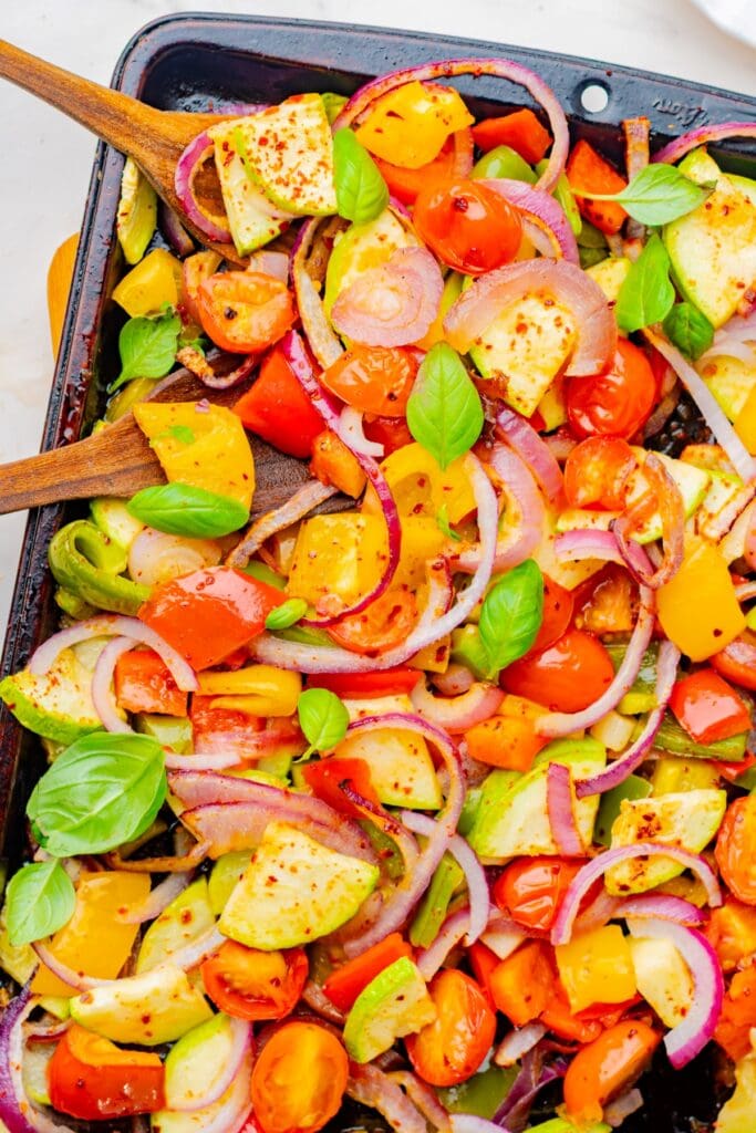 roastred veggies garnished with fresh basil.