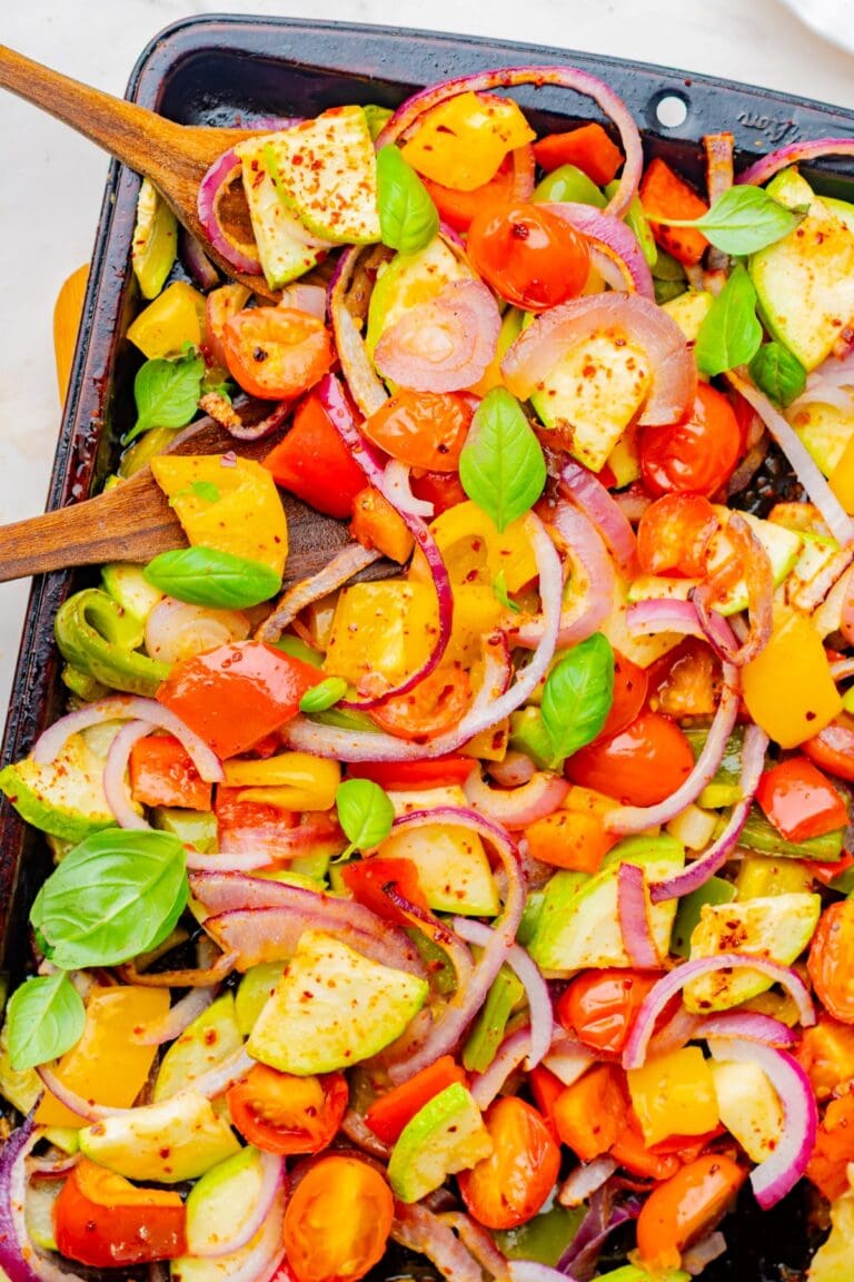 roastred veggies garnished with fresh basil.