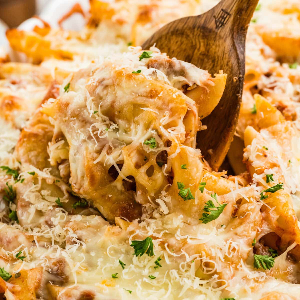 Taking a scoop of pasta.