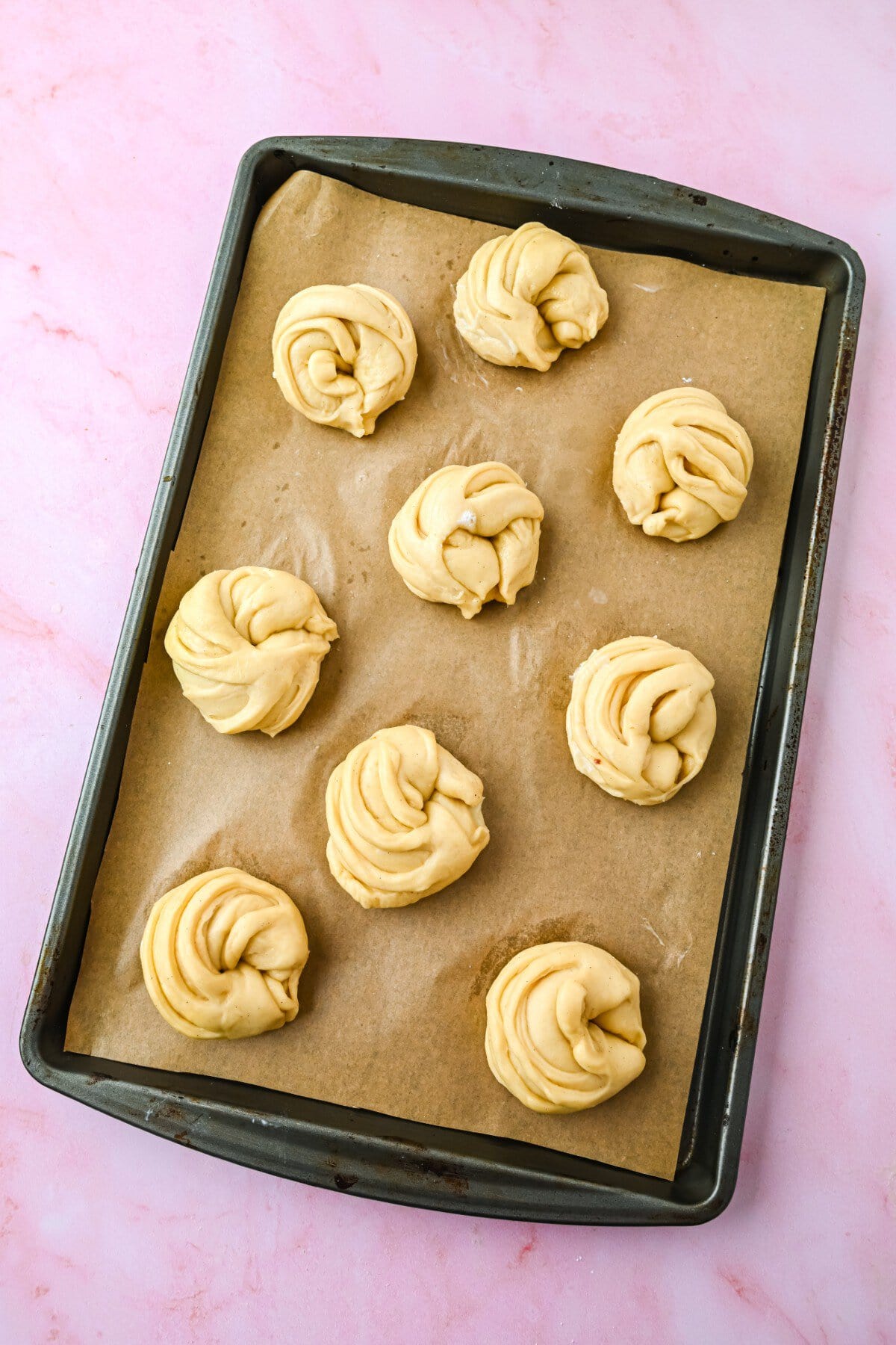 Buns on a baking sheet. 