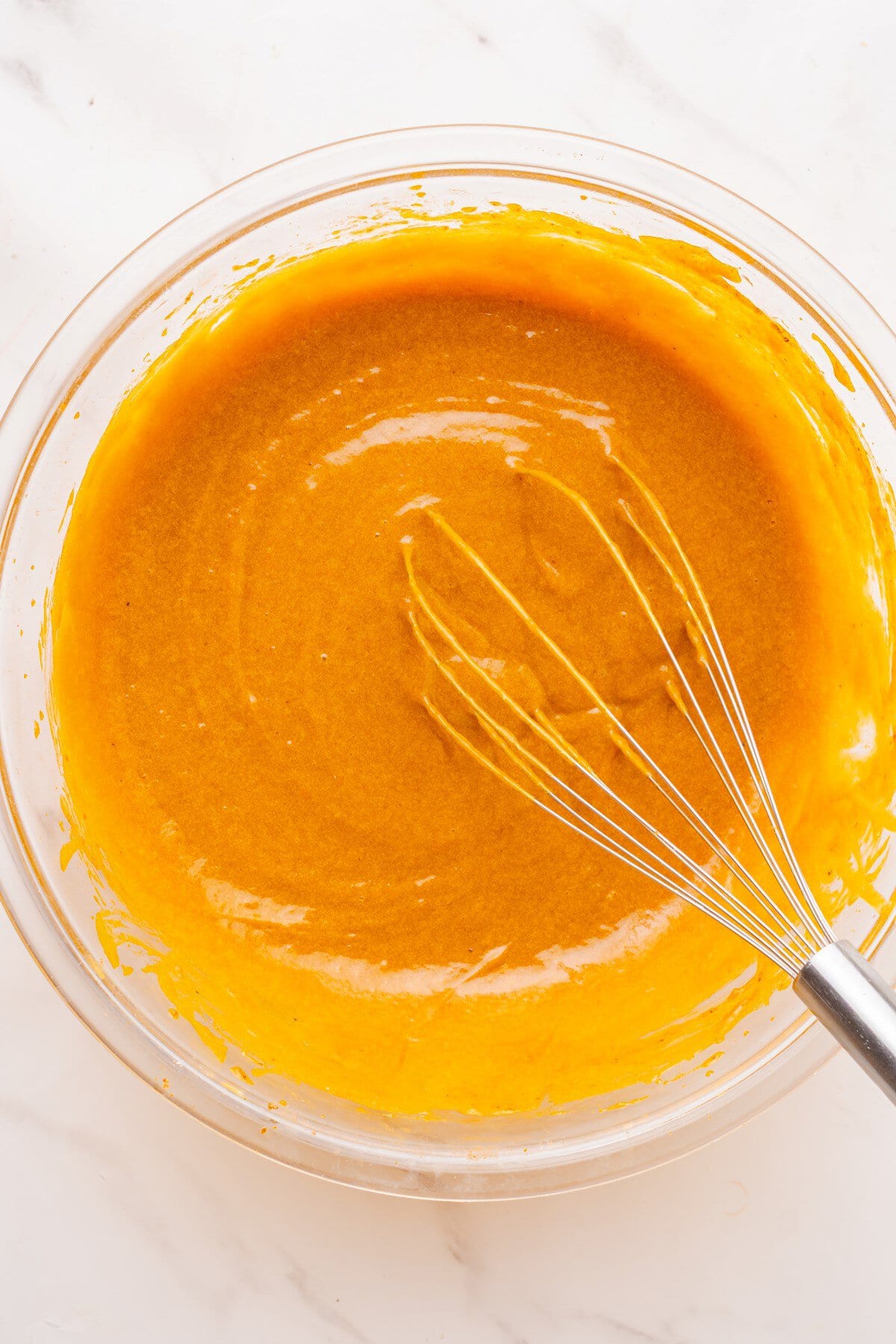 Mixing the wet ingredients.