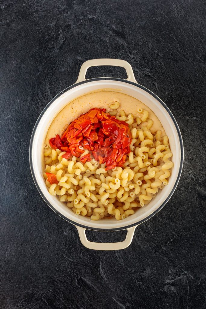 Cooked macaroni and roasted red peppers added.