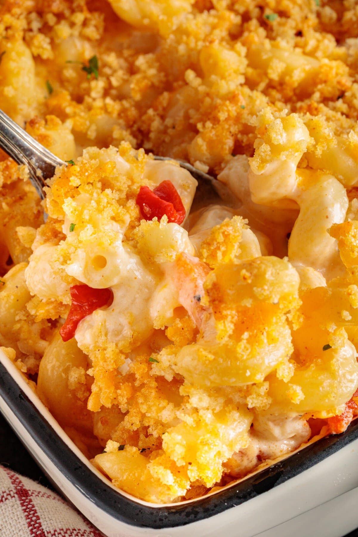 Spooning out Pimento Cheese Mac and Cheese.