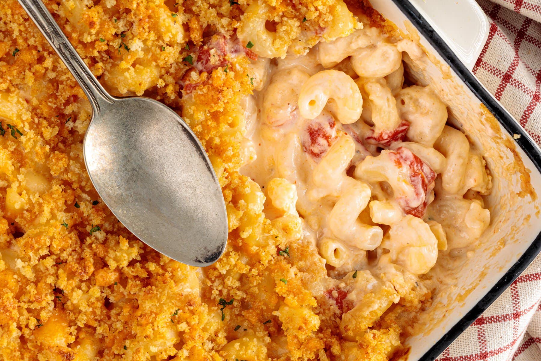 With a spoonful scooped out of the casserole.