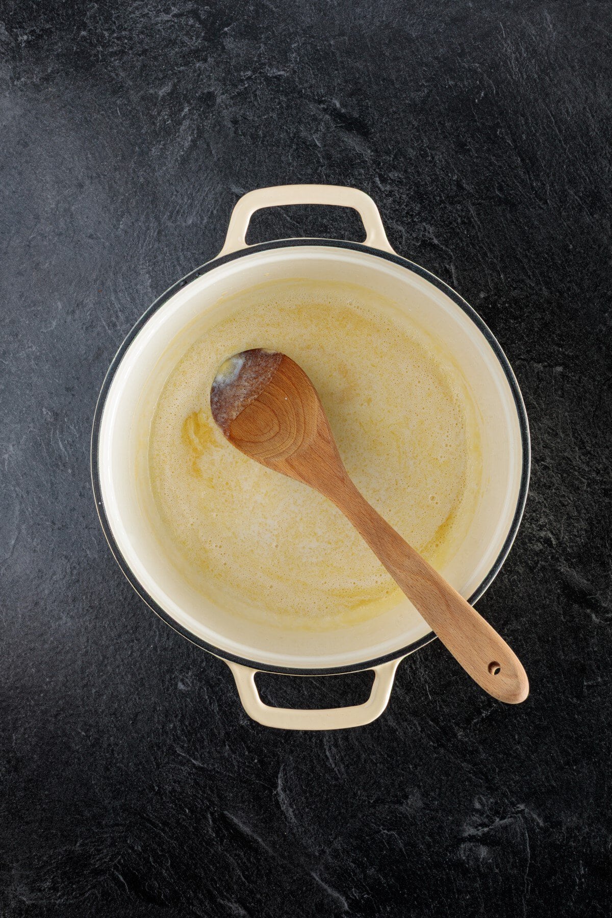 Milk mixed with the butter flour mixture.